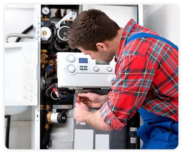 plumber tech working on an electrical pipe control system